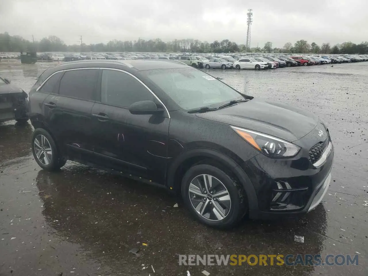 4 Photograph of a damaged car KNDCB3LC3N5534067 KIA NIRO 2022
