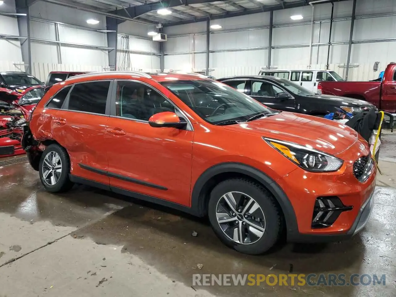 4 Photograph of a damaged car KNDCB3LC9N5545669 KIA NIRO 2022