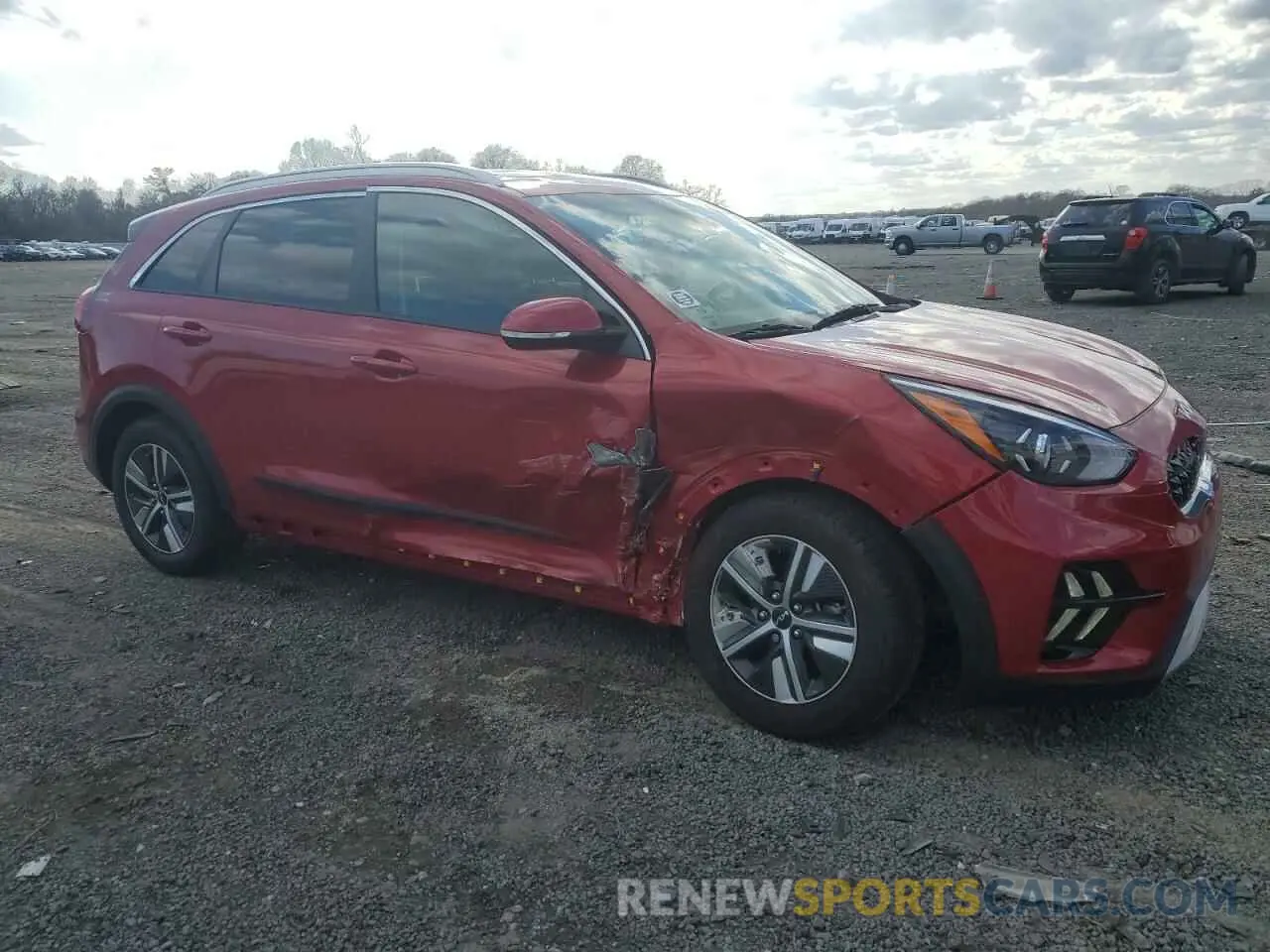 4 Photograph of a damaged car KNDCE3LCXN5547082 KIA NIRO 2022