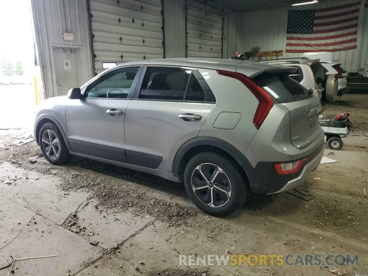 2 Photograph of a damaged car KNDCP3LE8P5065192 KIA NIRO 2023