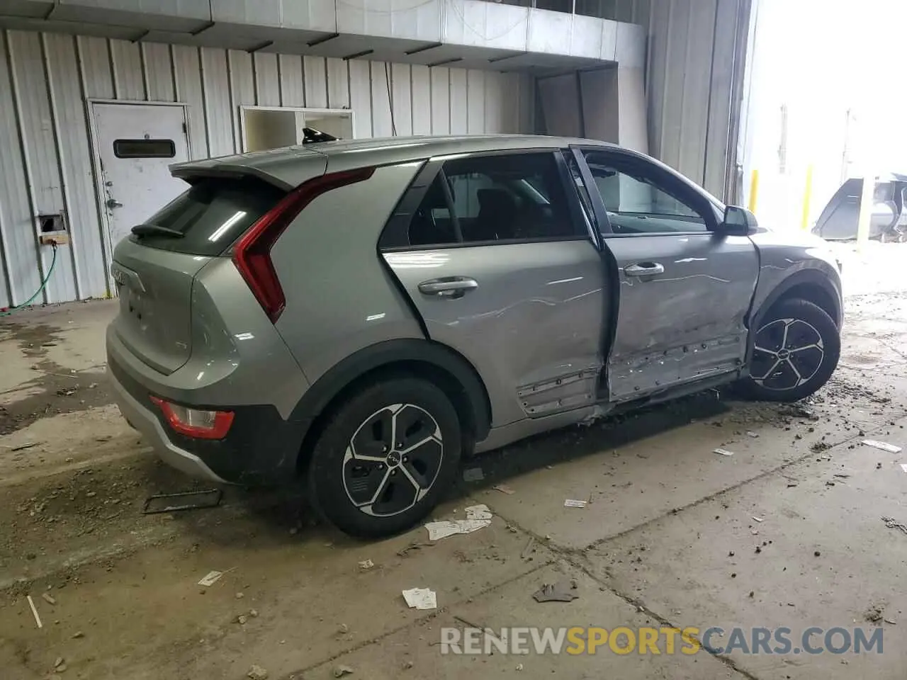 3 Photograph of a damaged car KNDCP3LE8P5065192 KIA NIRO 2023
