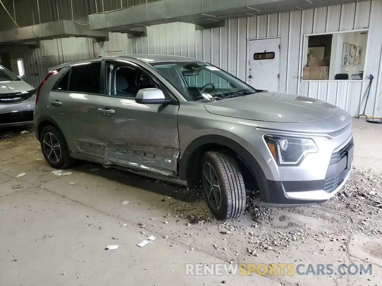 4 Photograph of a damaged car KNDCP3LE8P5065192 KIA NIRO 2023