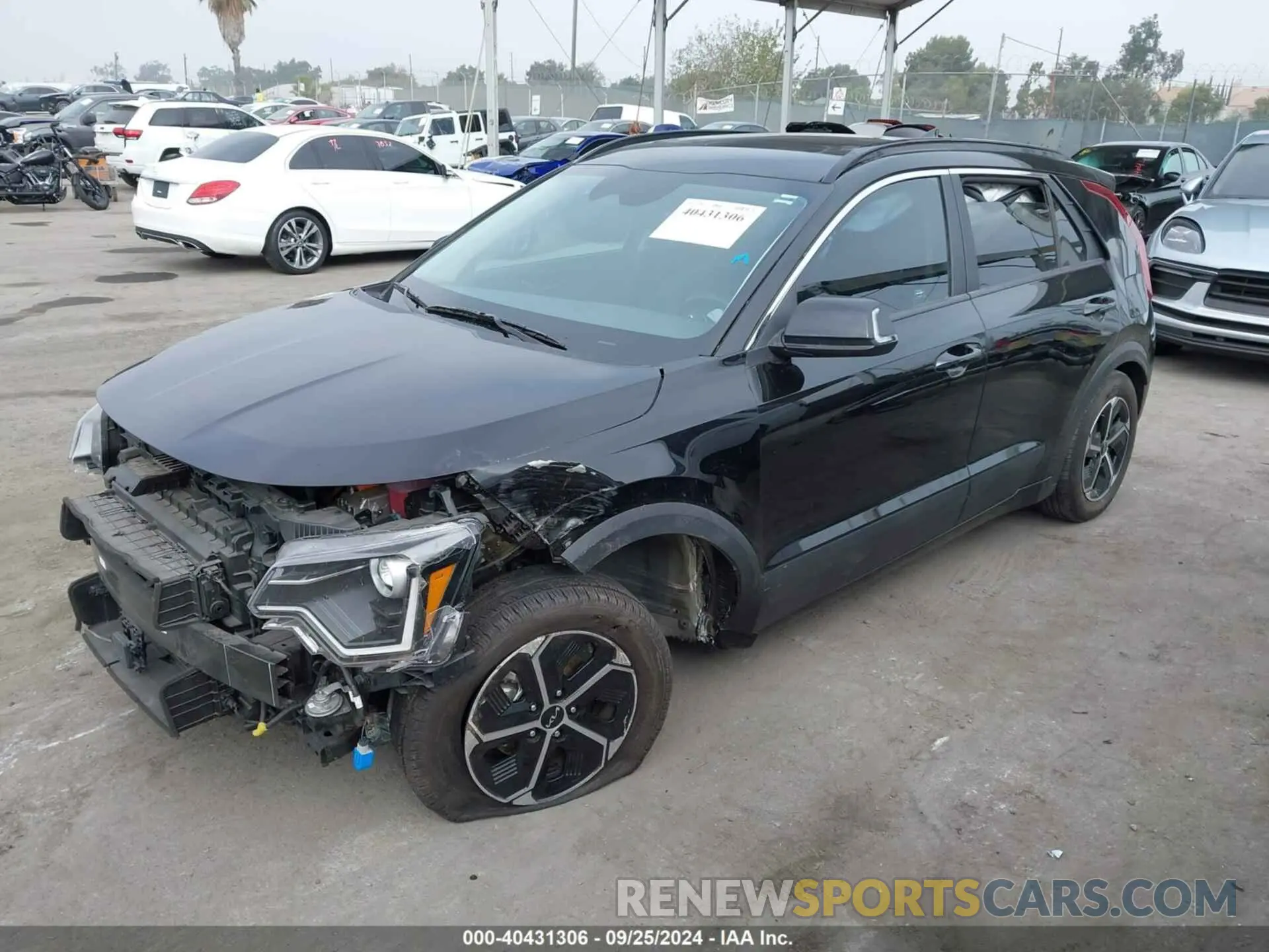 2 Photograph of a damaged car KNDCR3LE0P5059204 KIA NIRO 2023