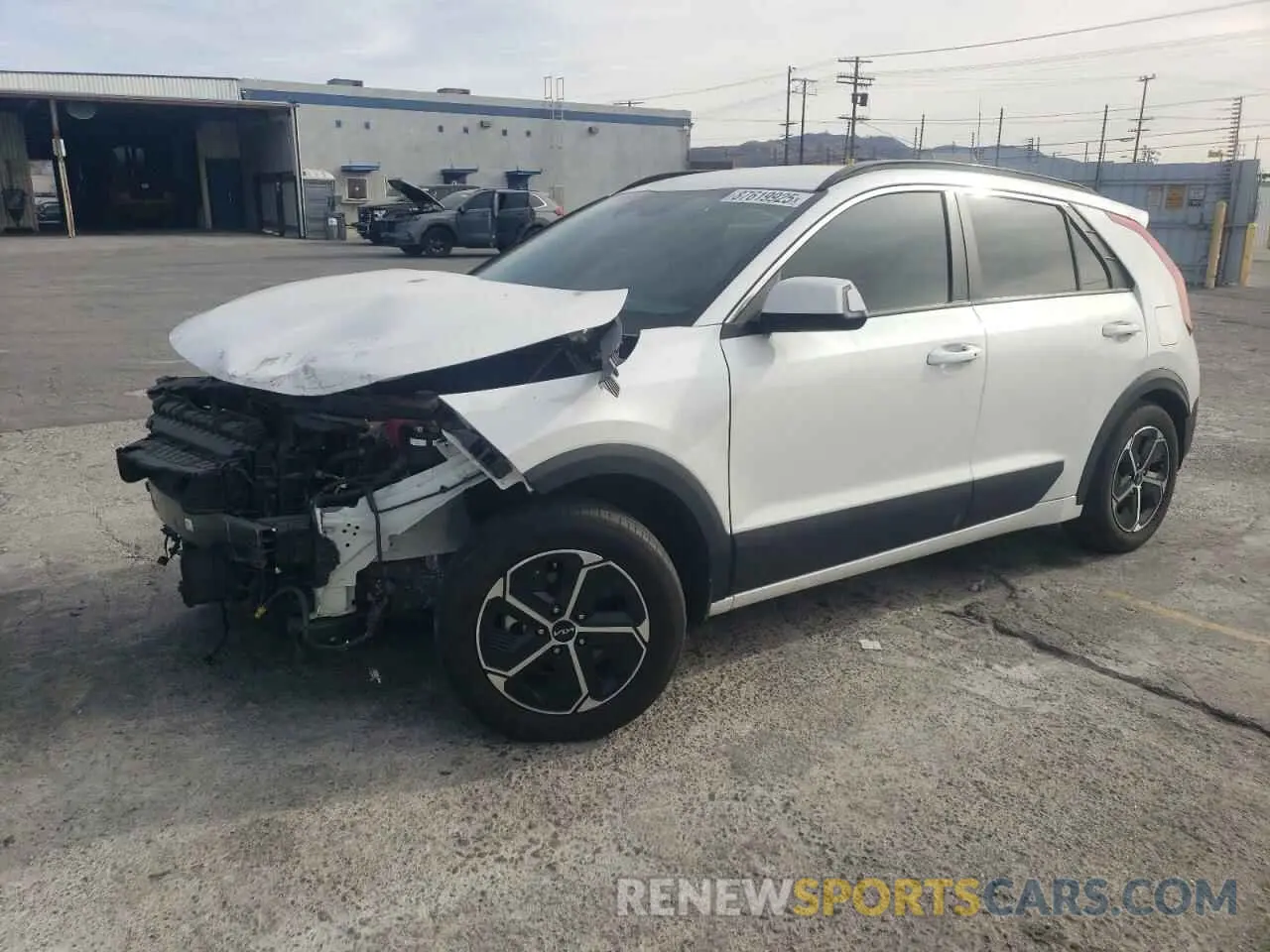 1 Photograph of a damaged car KNDCR3LE2P5073492 KIA NIRO 2023