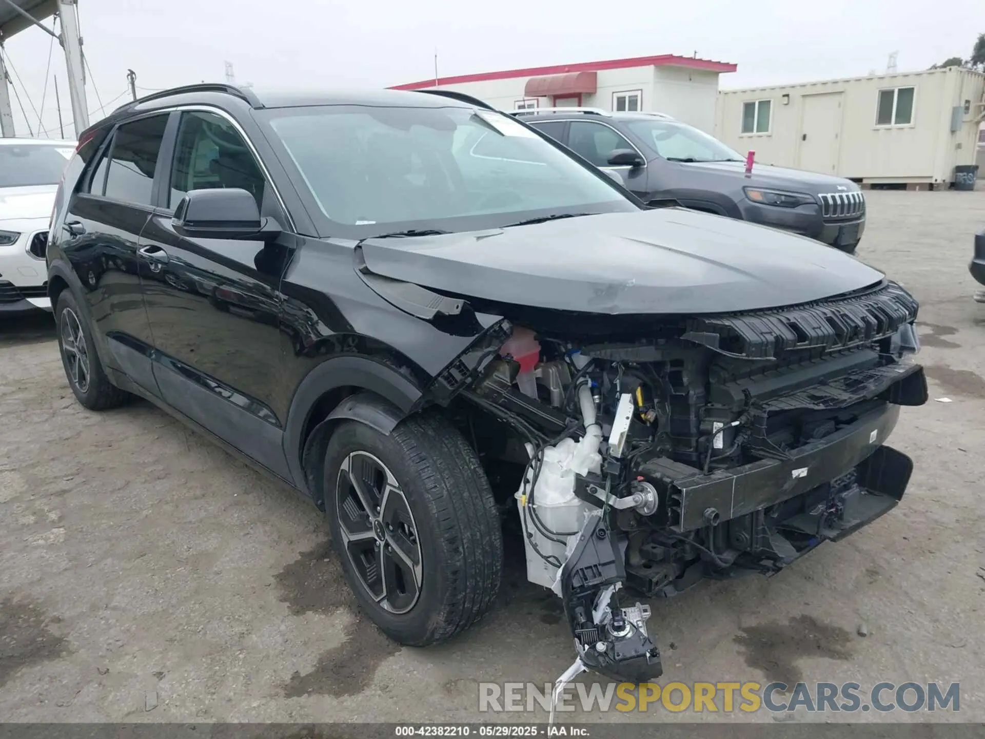 1 Photograph of a damaged car KNDCR3LE6P5050216 KIA NIRO 2023