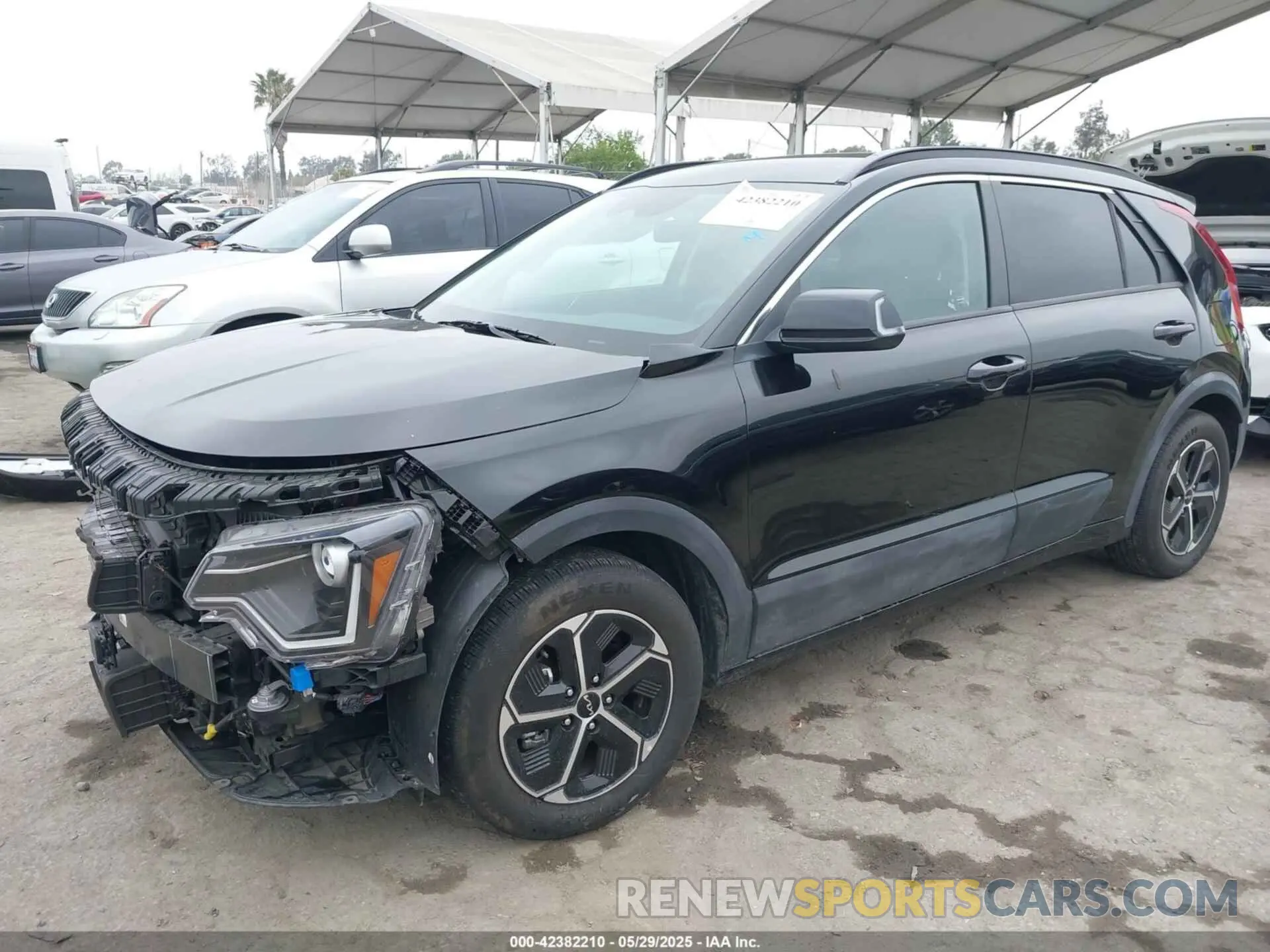 2 Photograph of a damaged car KNDCR3LE6P5050216 KIA NIRO 2023