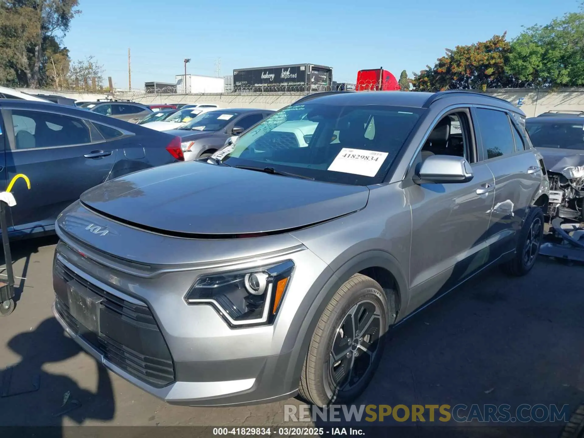 2 Photograph of a damaged car KNDCR3LE6P5051446 KIA NIRO 2023