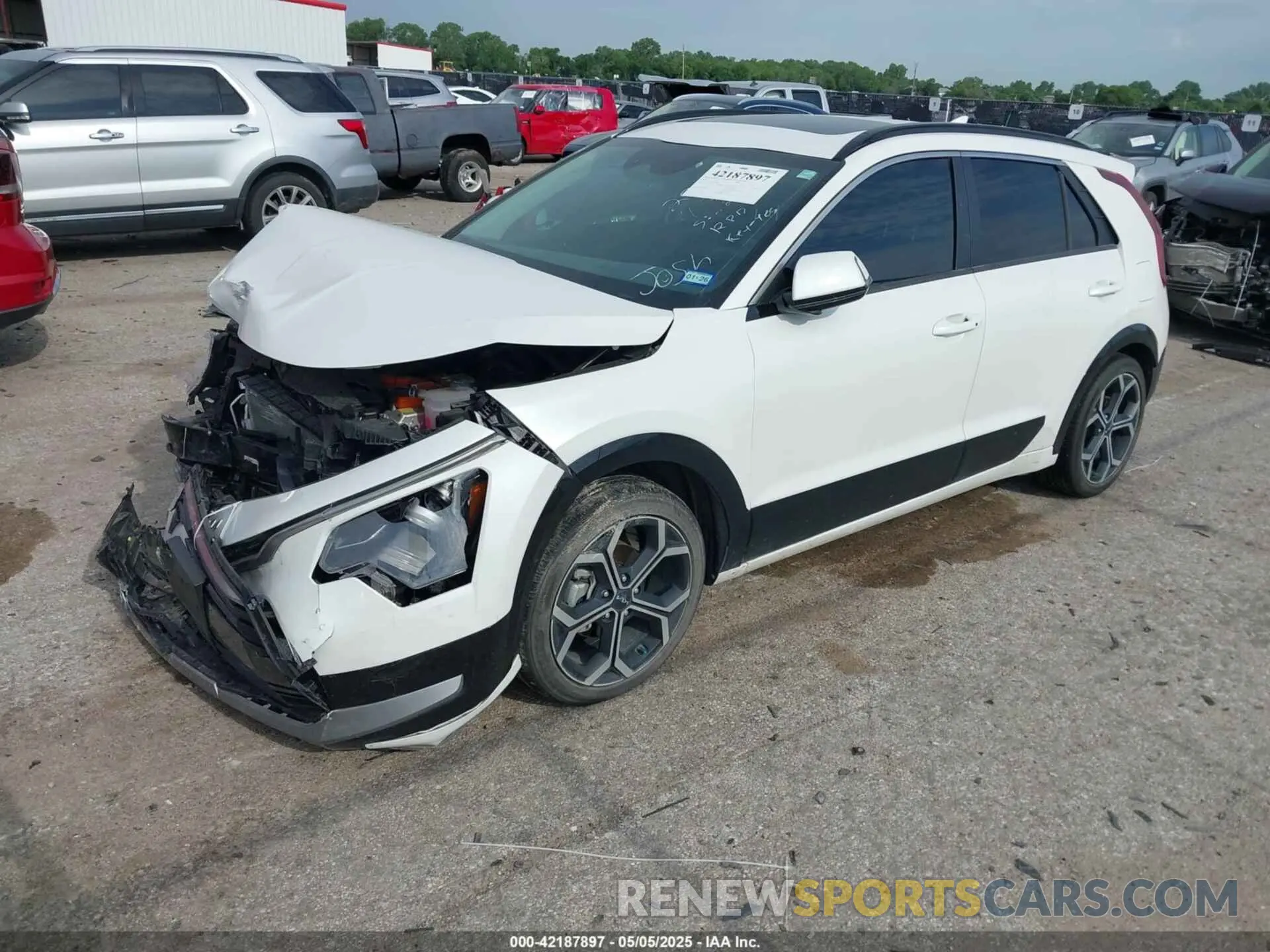 2 Photograph of a damaged car KNDCR3LE7P5060883 KIA NIRO 2023