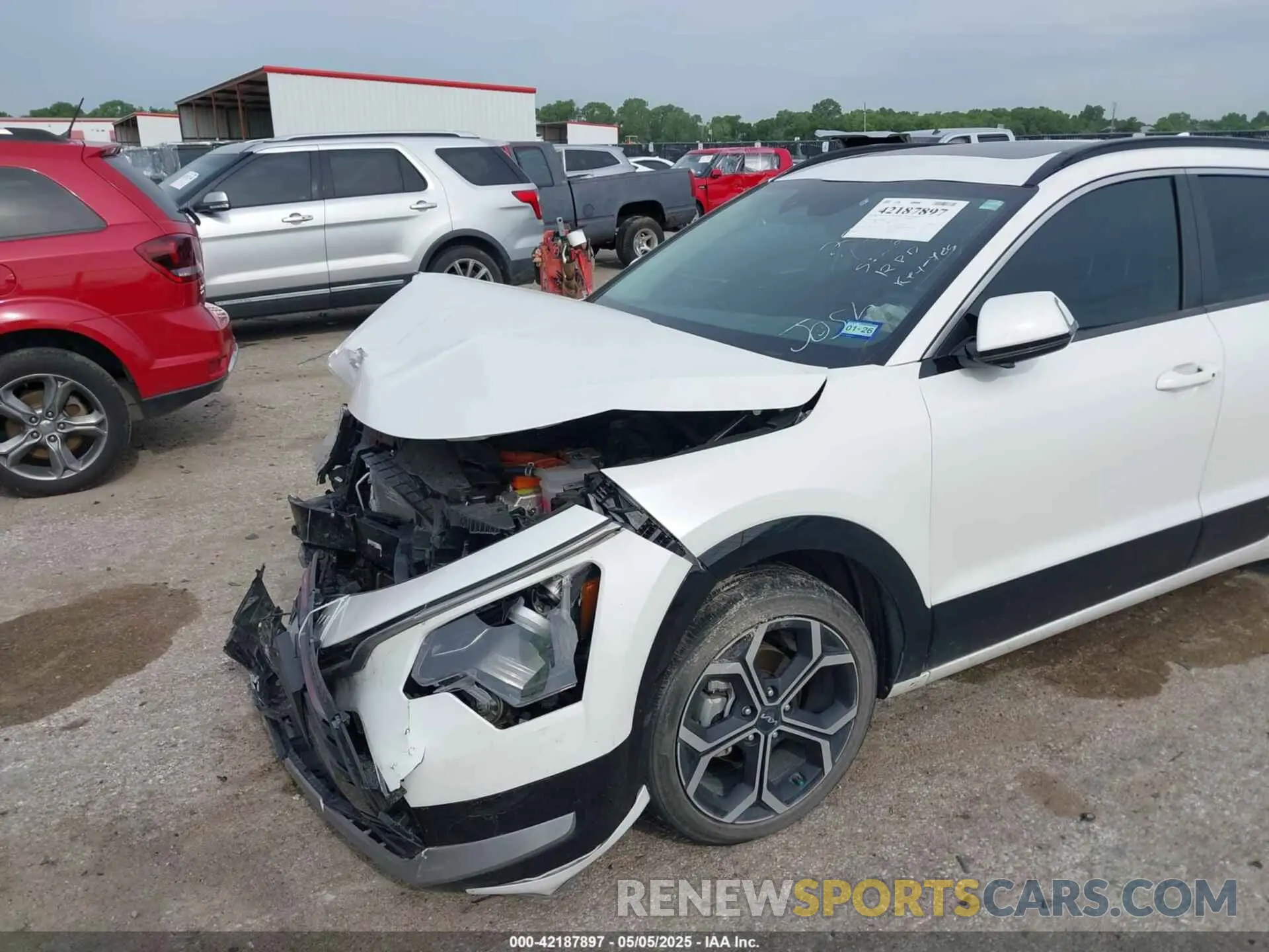 6 Photograph of a damaged car KNDCR3LE7P5060883 KIA NIRO 2023