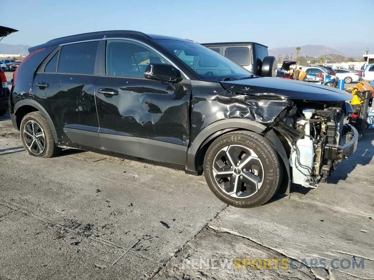 4 Photograph of a damaged car KNDCR3LE9P5076681 KIA NIRO 2023