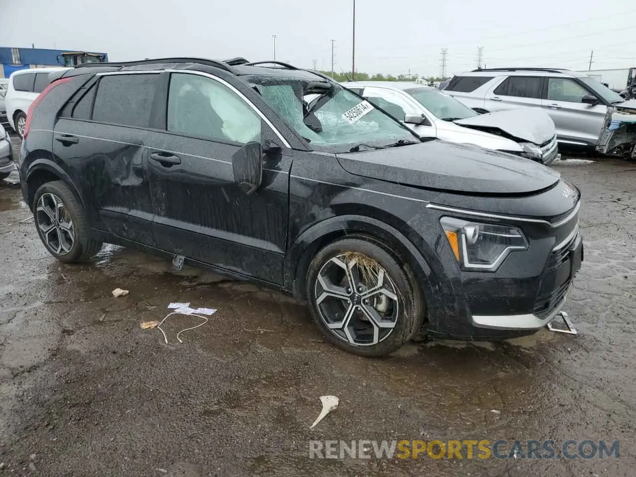 4 Photograph of a damaged car KNDCR3LEXP5039932 KIA NIRO 2023