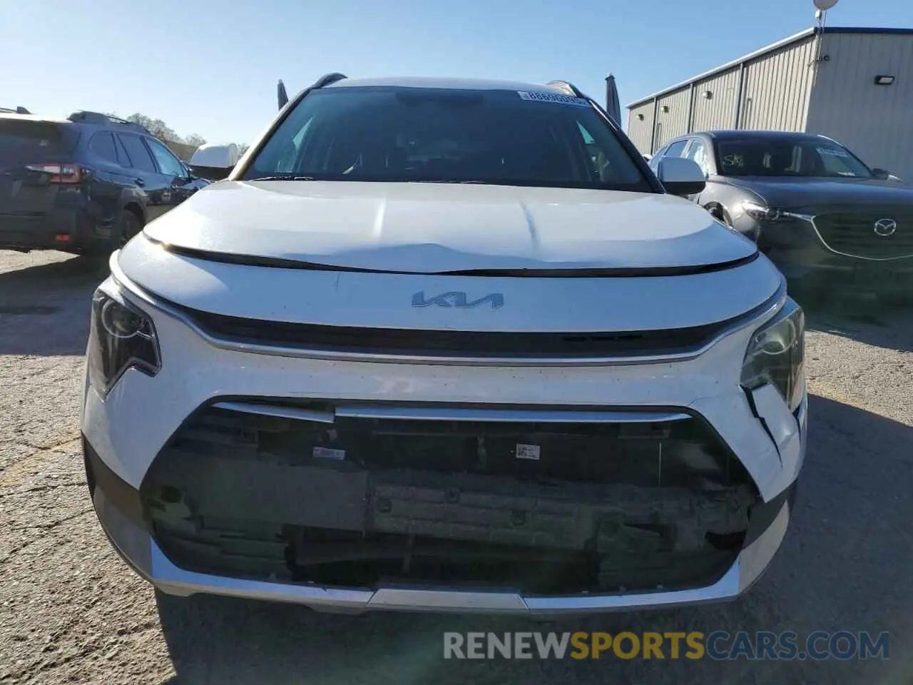 5 Photograph of a damaged car KNDCS3LF6P5113912 KIA NIRO 2023