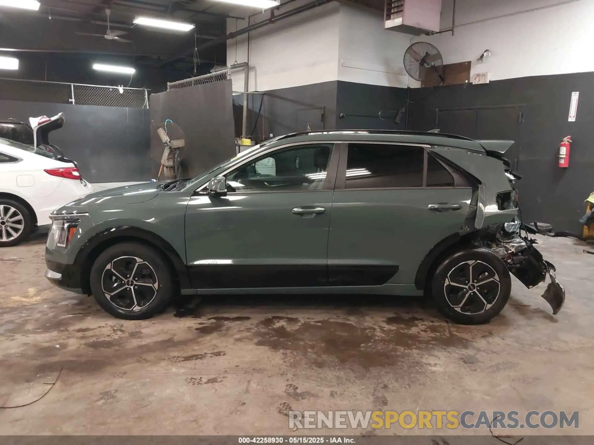 14 Photograph of a damaged car KNDCT3LE9P5045660 KIA NIRO 2023