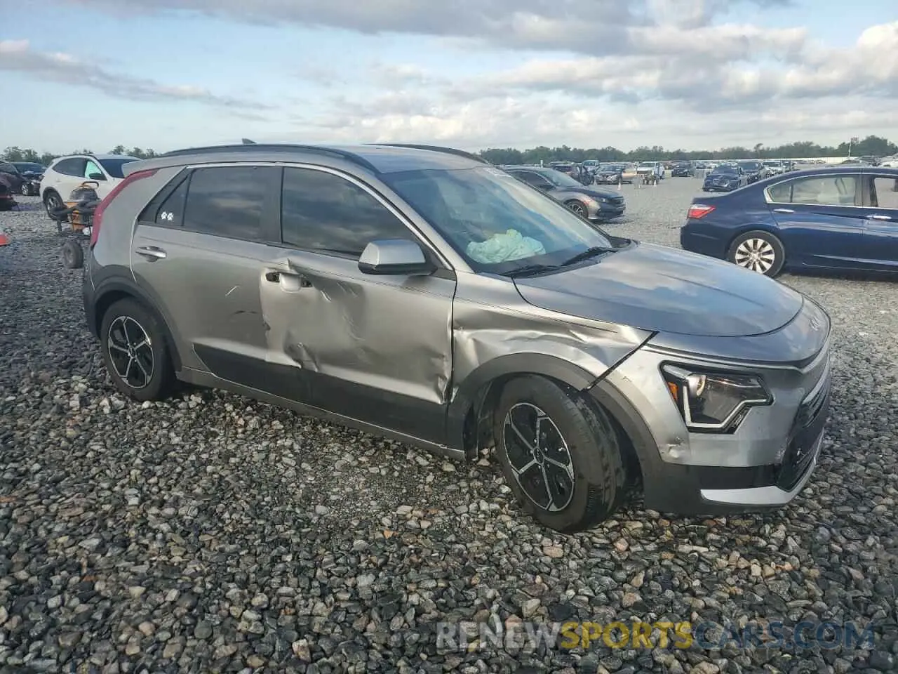 4 Photograph of a damaged car KNDCP3LE9R5121630 KIA NIRO 2024