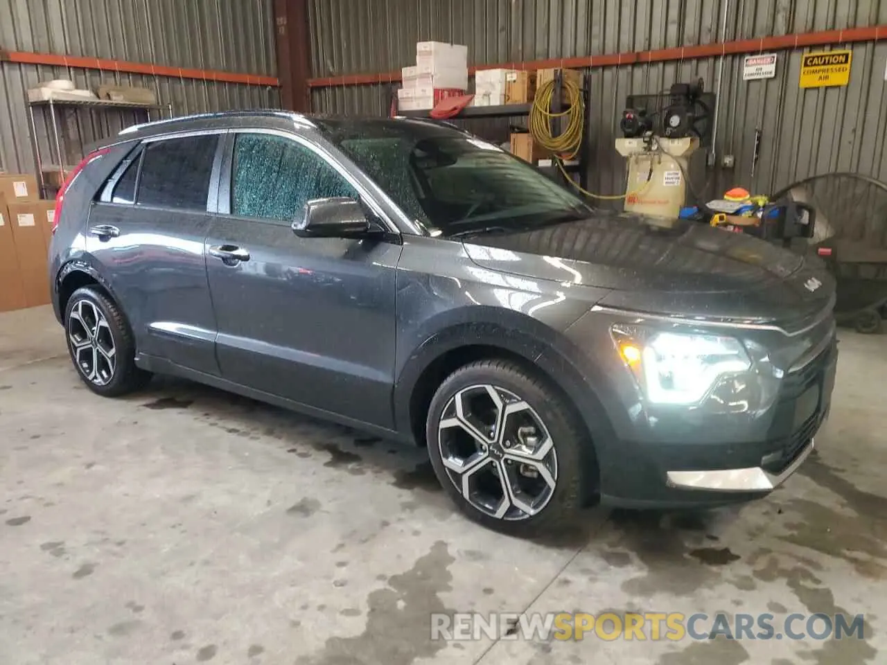 4 Photograph of a damaged car KNDCT3LE3P5050630 KIA NIRO SX 2023