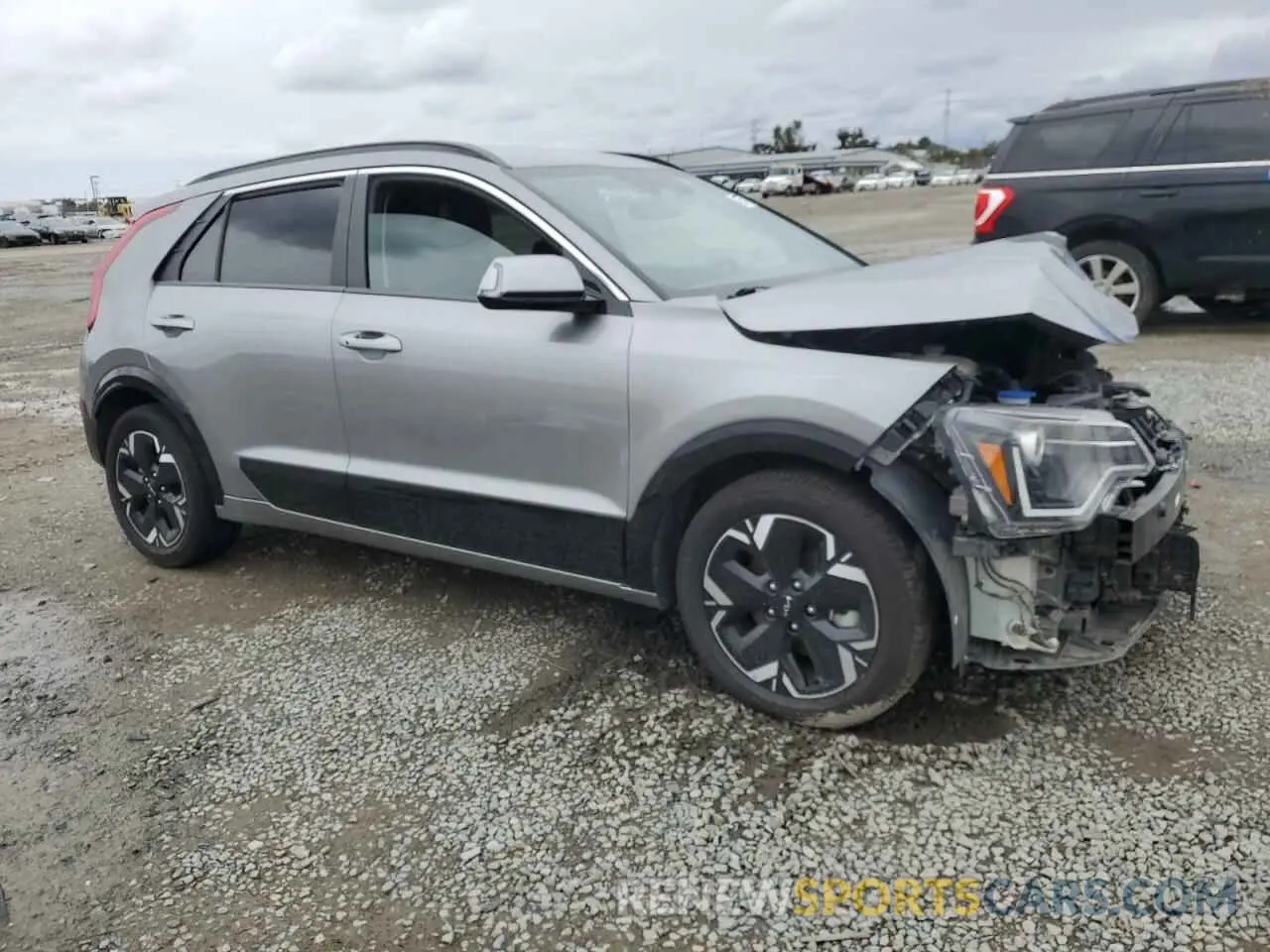 4 Photograph of a damaged car KNDCR3L11P5028833 KIA NIRO WIND 2023