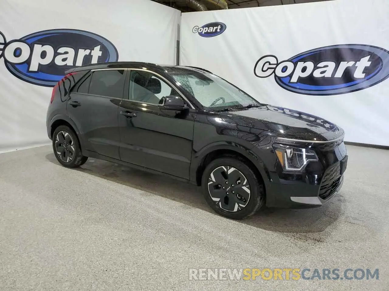 4 Photograph of a damaged car KNDCR3L17P5026469 KIA NIRO WIND 2023