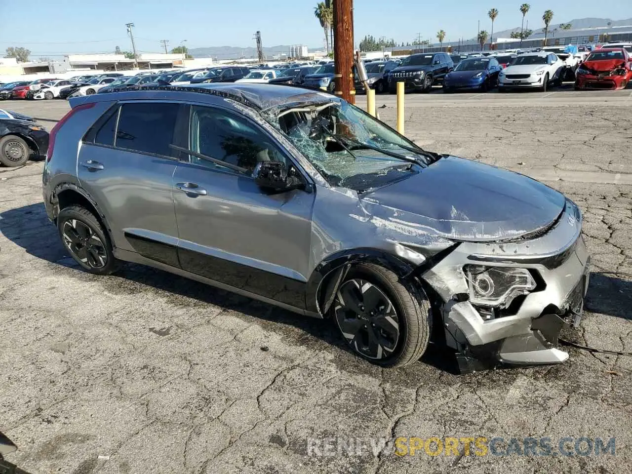4 Photograph of a damaged car KNDCR3L18P5036573 KIA NIRO WIND 2023