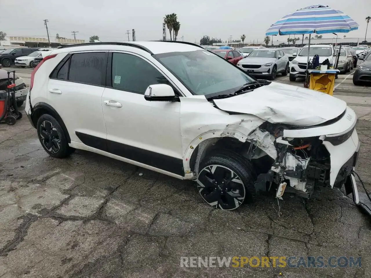 4 Photograph of a damaged car KNDCR3L18P5045497 KIA NIRO WIND 2023