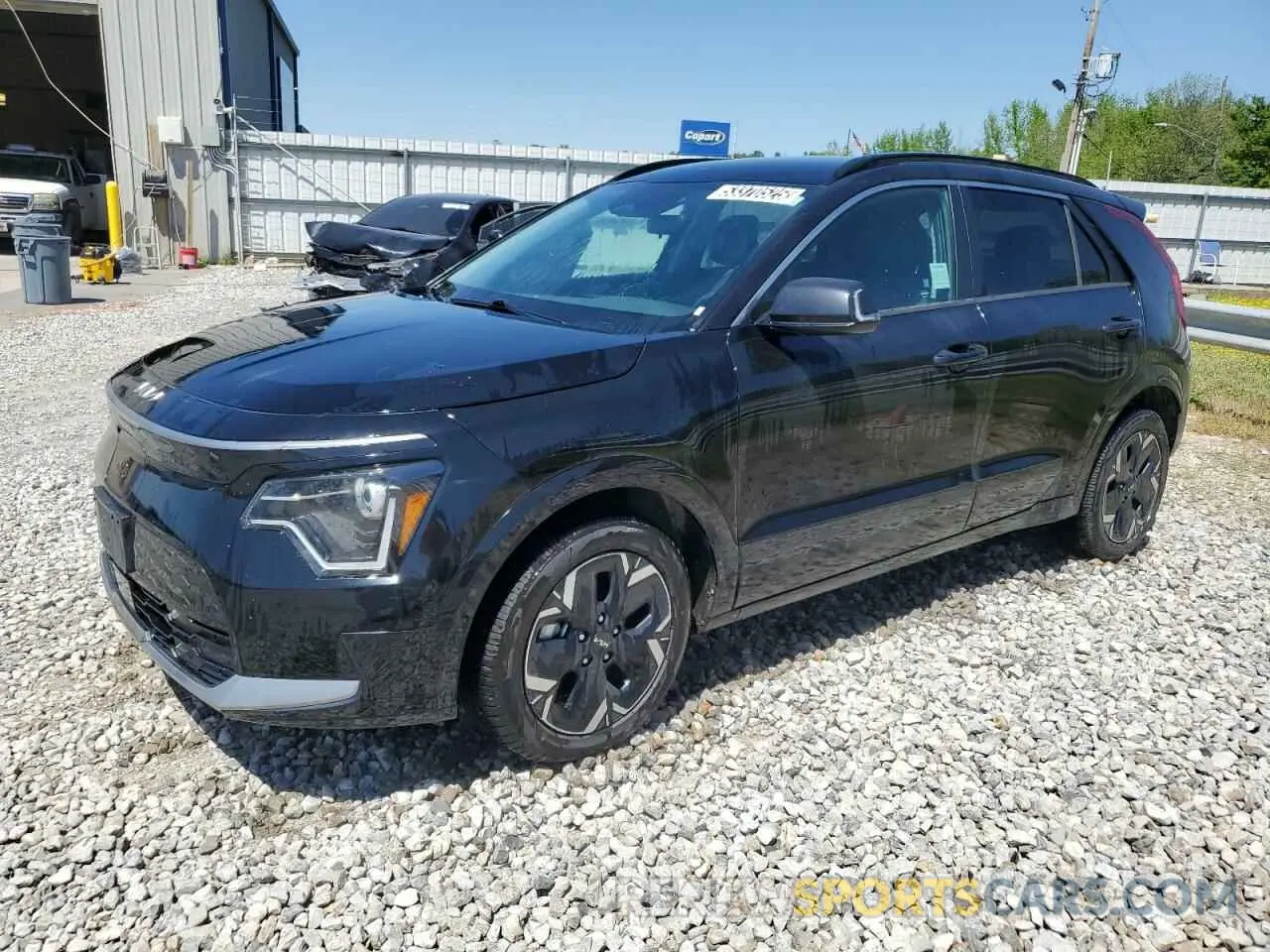 1 Photograph of a damaged car KNDCR3L19P5026490 KIA NIRO WIND 2023