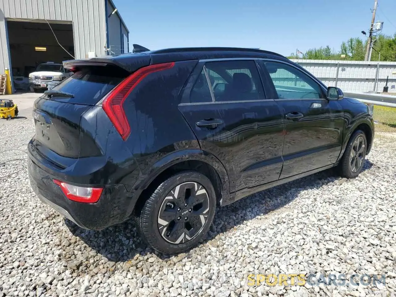 3 Photograph of a damaged car KNDCR3L19P5026490 KIA NIRO WIND 2023