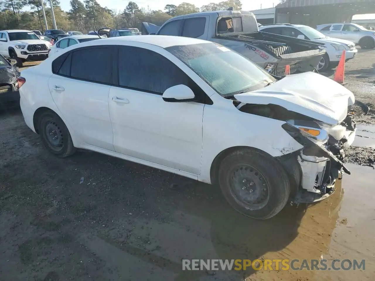 4 Photograph of a damaged car 3KPA24AD3NE479603 KIA RIO 2022