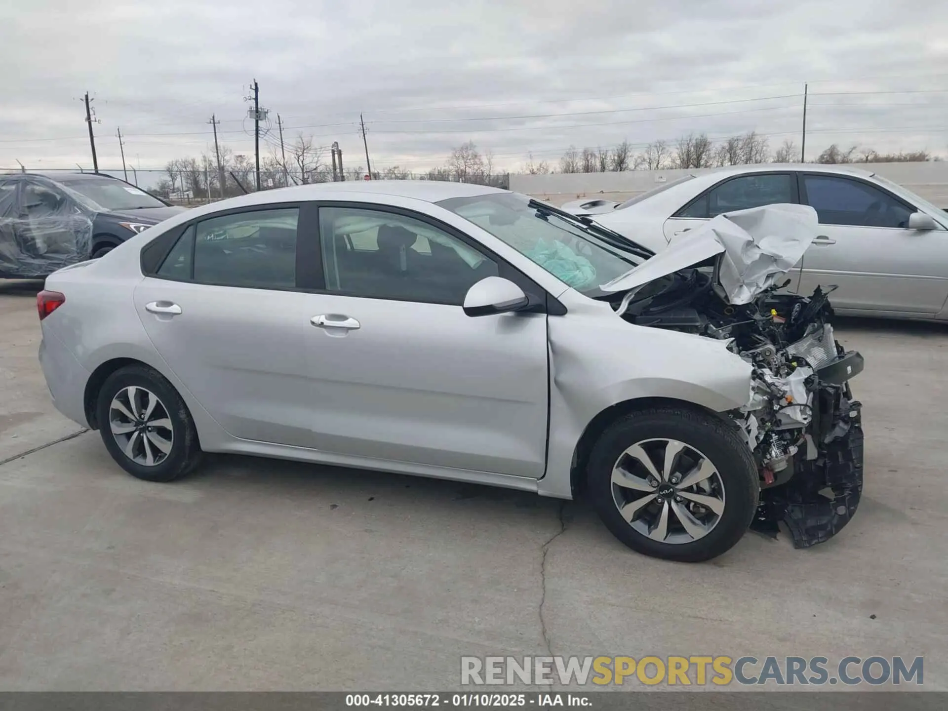 13 Photograph of a damaged car 3KPA24AD1PE584224 KIA RIO 2023