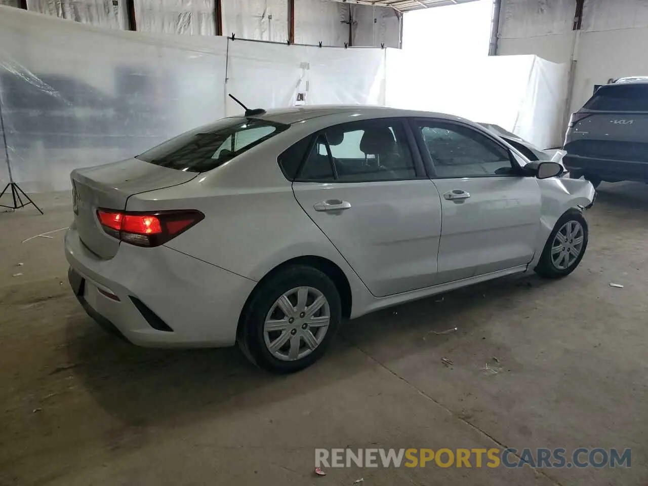 3 Photograph of a damaged car 3KPA24AD1PE618985 KIA RIO 2023
