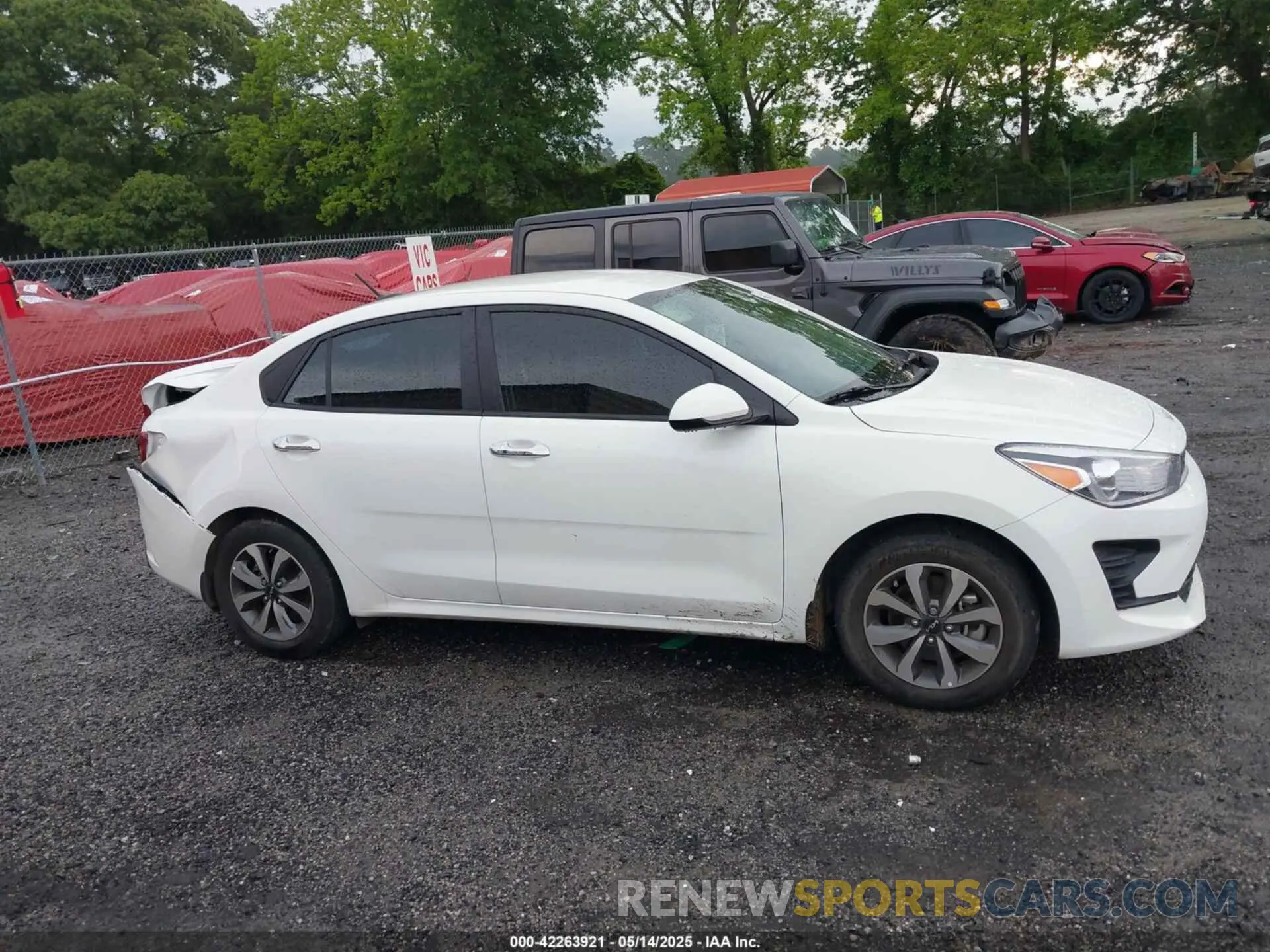 13 Photograph of a damaged car 3KPA24AD5PE520252 KIA RIO 2023