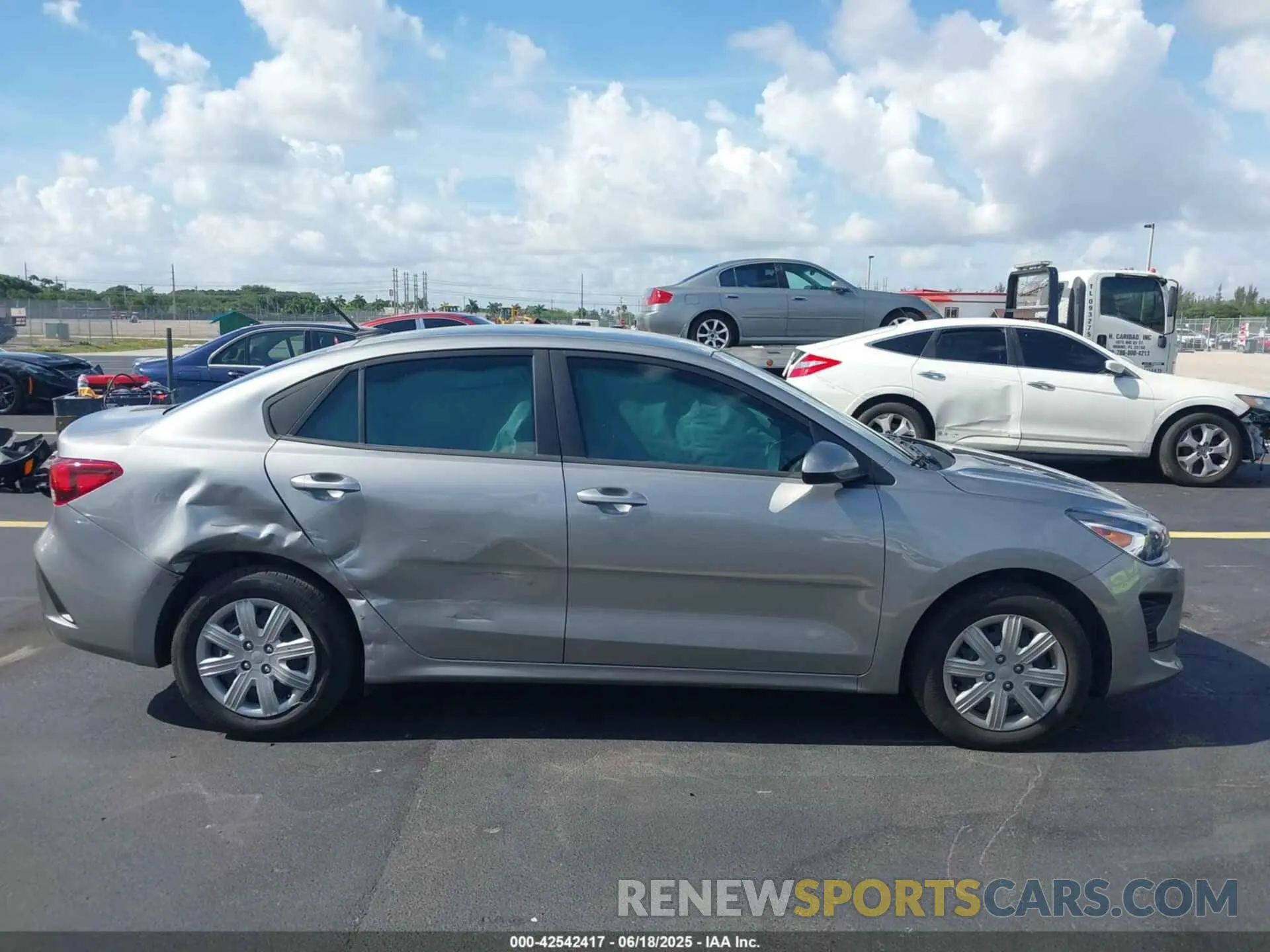 13 Photograph of a damaged car 3KPA24AD5PE565384 KIA RIO 2023