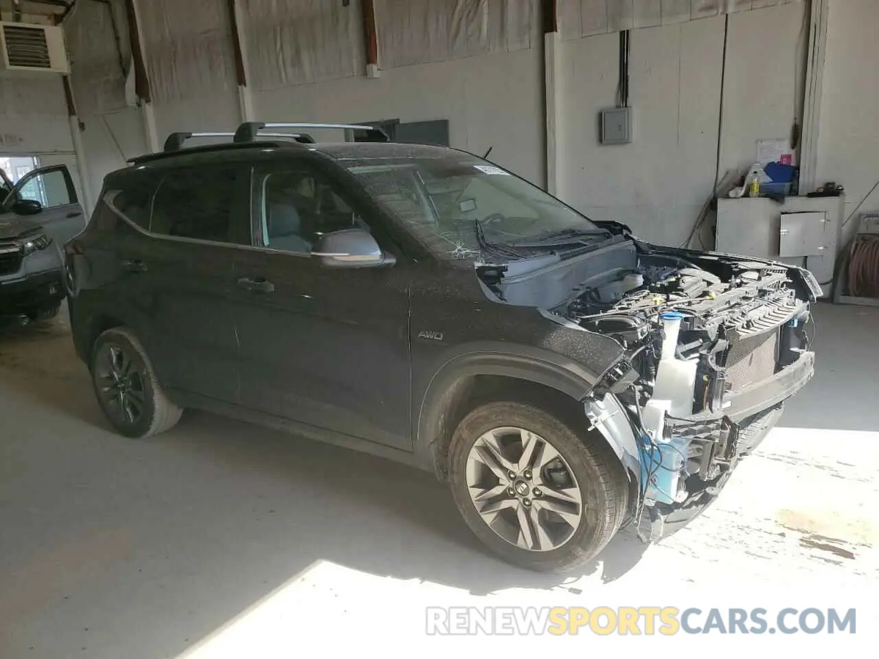 4 Photograph of a damaged car KNDEUCAA1M7083485 KIA SELTOS 2021