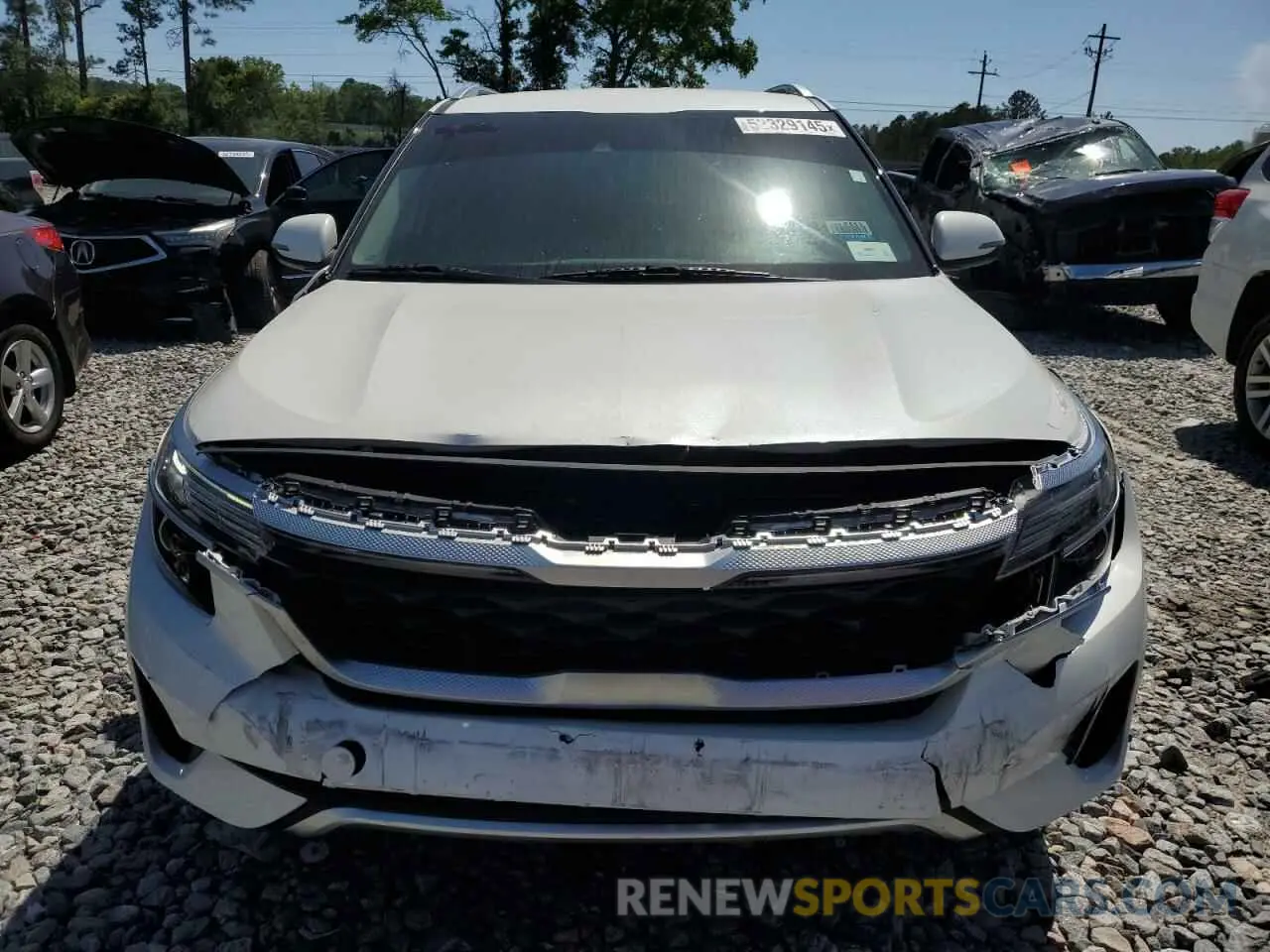 5 Photograph of a damaged car KNDEUCAA9M7209110 KIA SELTOS 2021