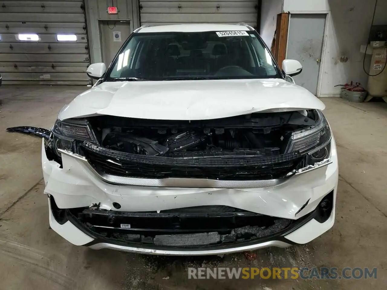 5 Photograph of a damaged car KNDEU2AA0N7306174 KIA SELTOS 2022