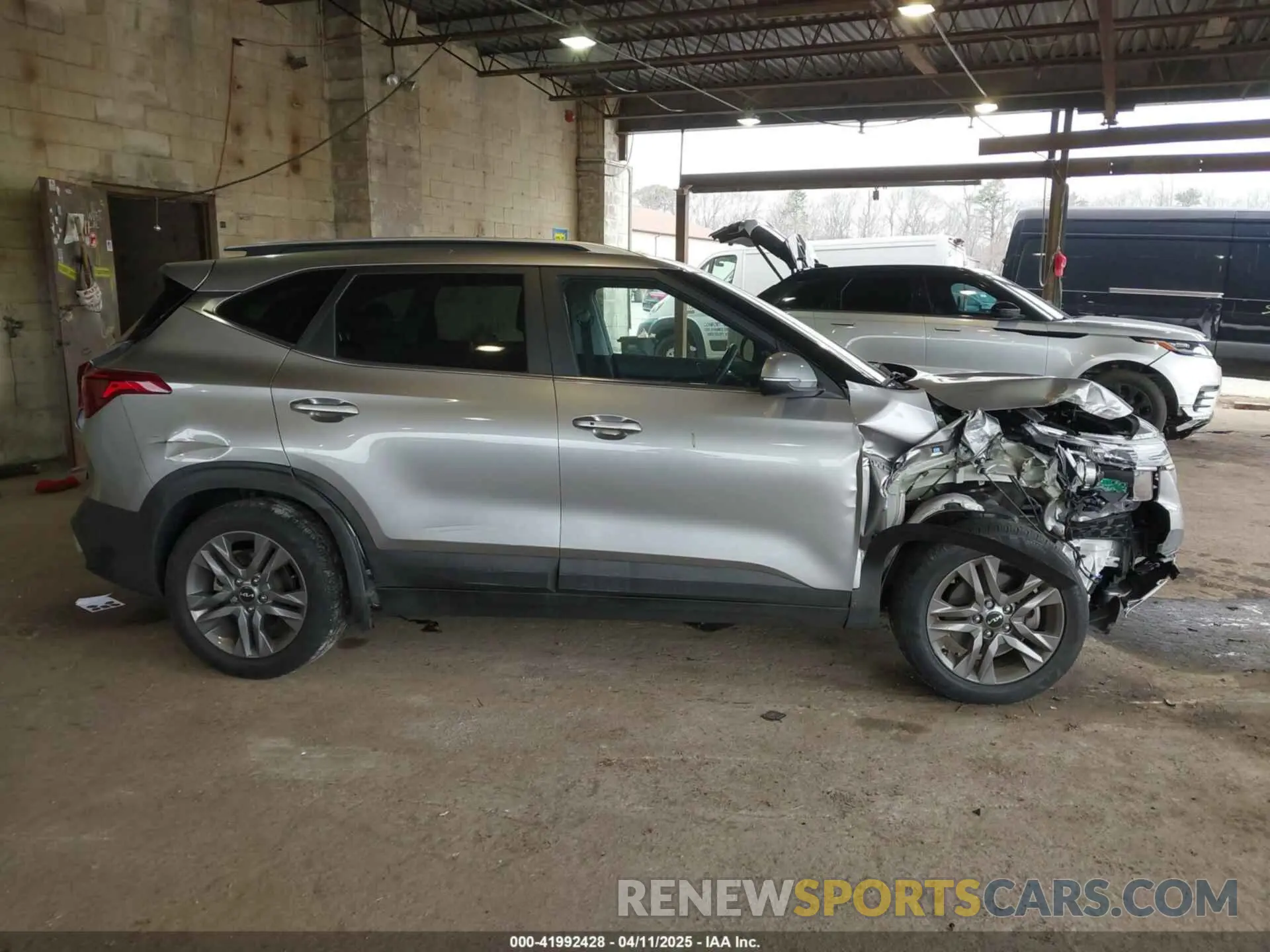 14 Photograph of a damaged car KNDEUCAA9N7307684 KIA SELTOS 2022