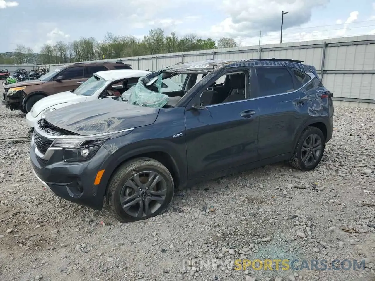 1 Photograph of a damaged car KNDEUCAA5P7395877 KIA SELTOS 2023