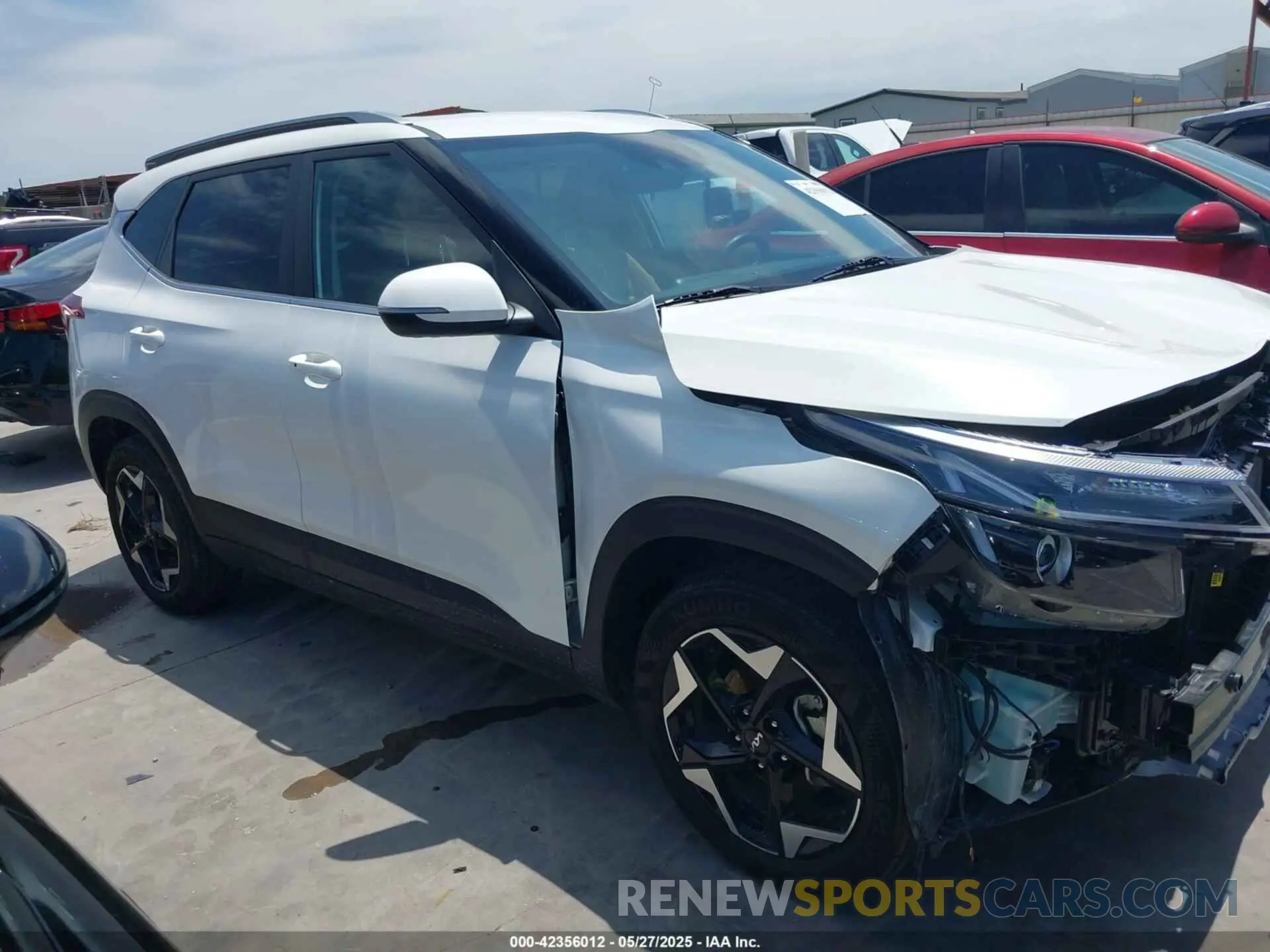 14 Photograph of a damaged car KNDER2AA6R7662880 KIA SELTOS 2024