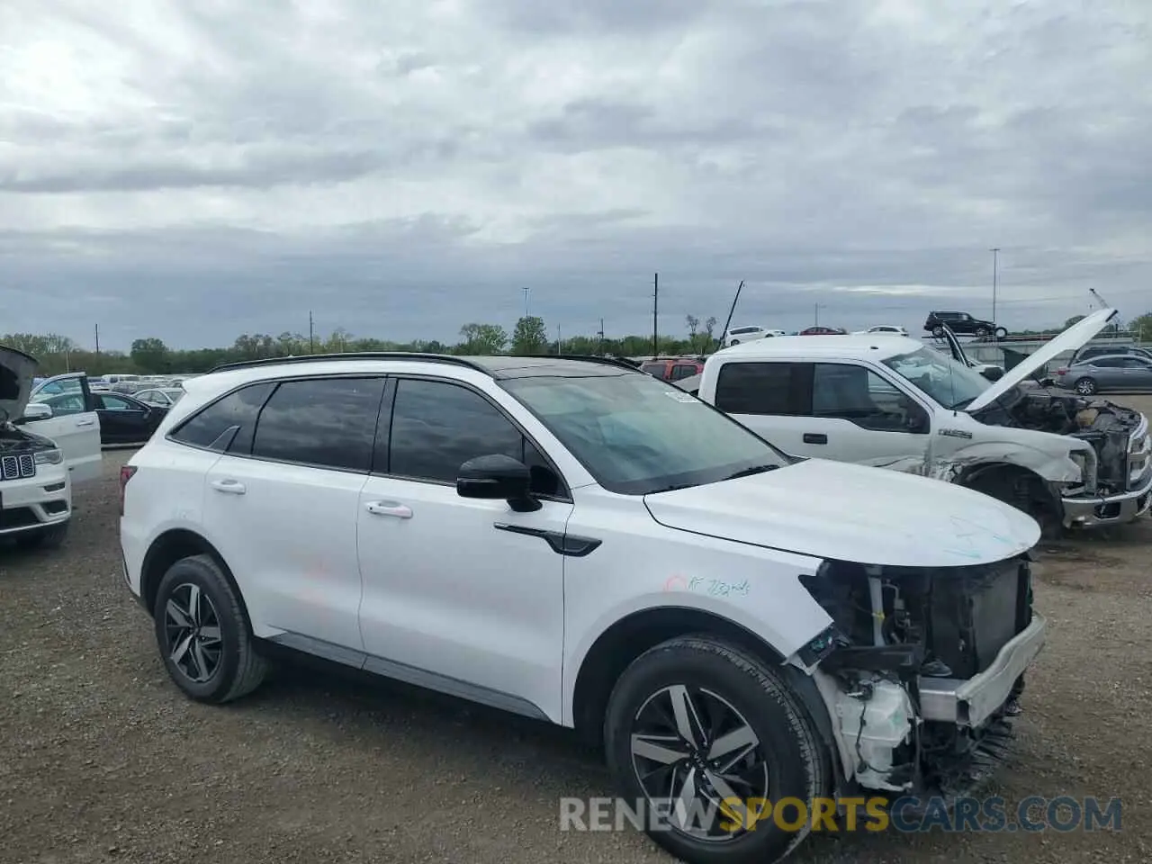 4 Photograph of a damaged car 5XYRL4LC8MG008357 KIA SORENTO 2021