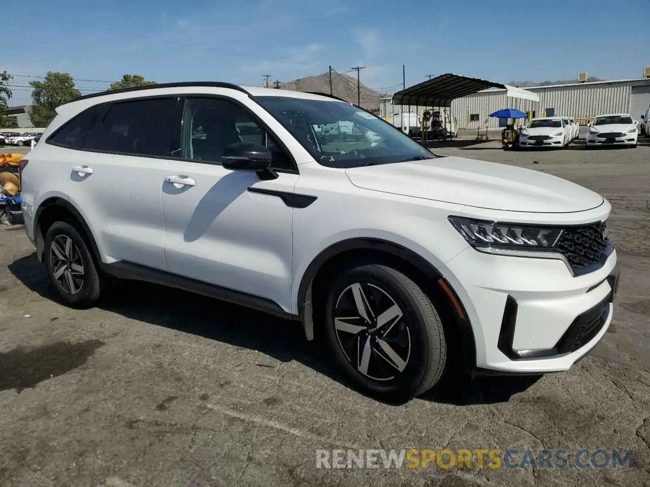 4 Photograph of a damaged car 5XYRL4LC7NG108922 KIA SORENTO 2022