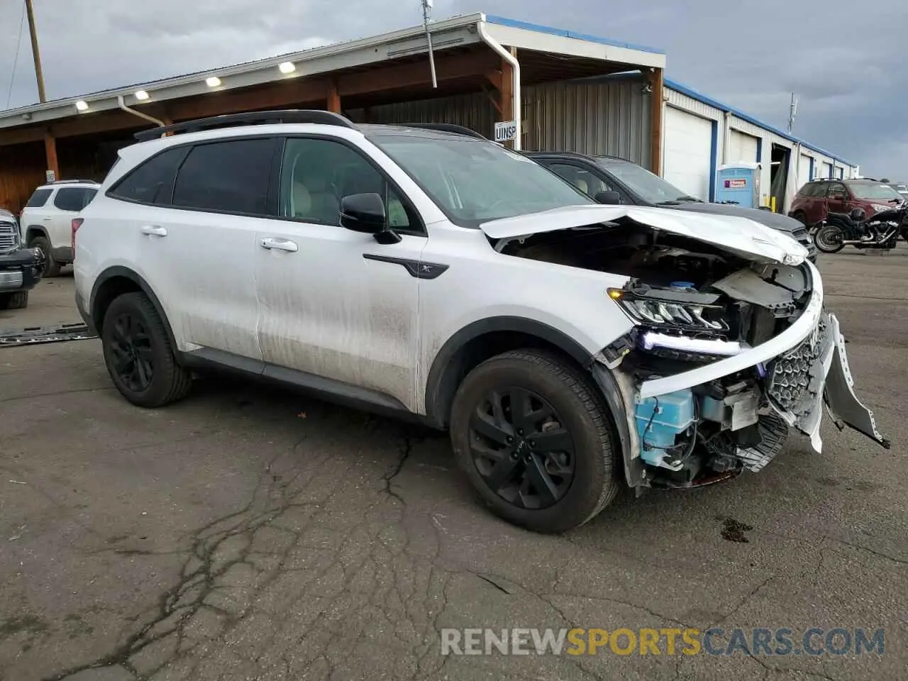 4 Photograph of a damaged car 5XYRLDLC2NG159938 KIA SORENTO 2022