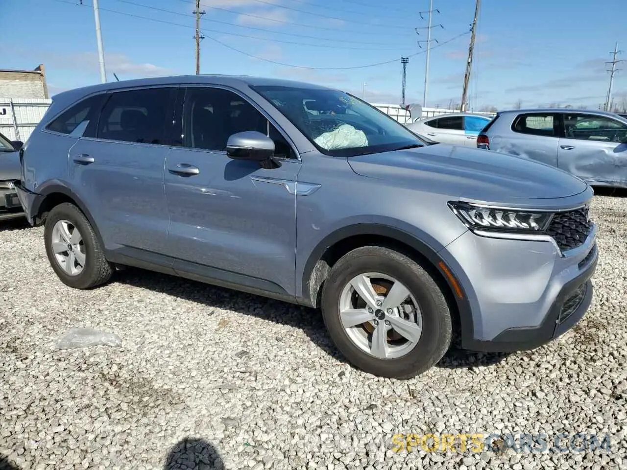 4 Photograph of a damaged car 5XYRG4LC5PG248636 KIA SORENTO 2023