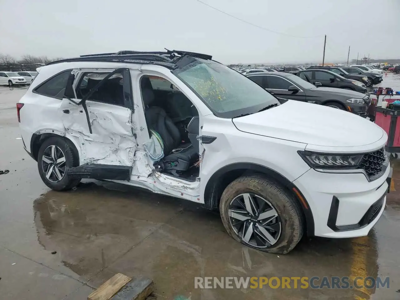 4 Photograph of a damaged car 5XYRH4LF5PG240060 KIA SORENTO 2023