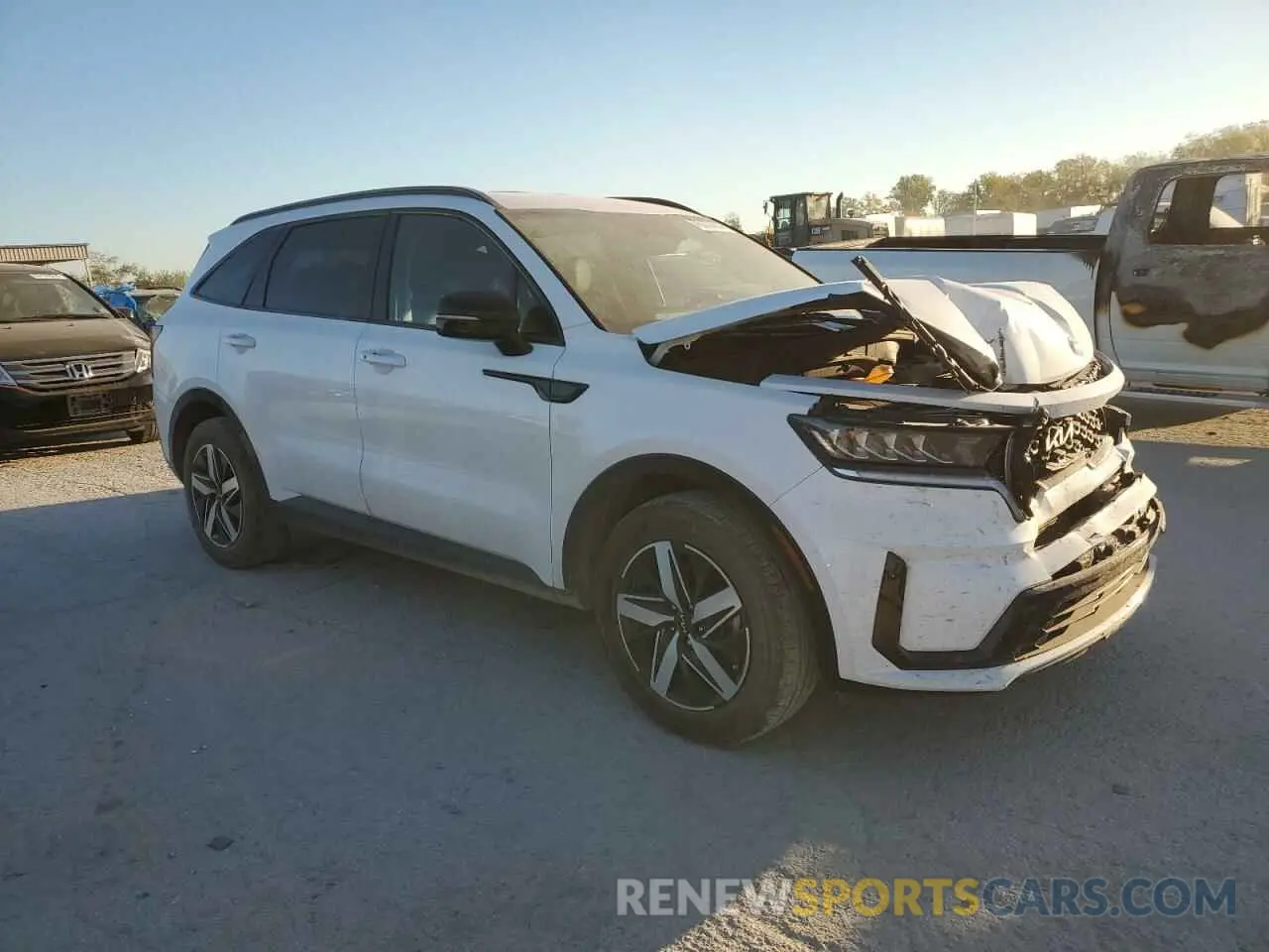 4 Photograph of a damaged car 5XYRL4LC9PG203212 KIA SORENTO 2023