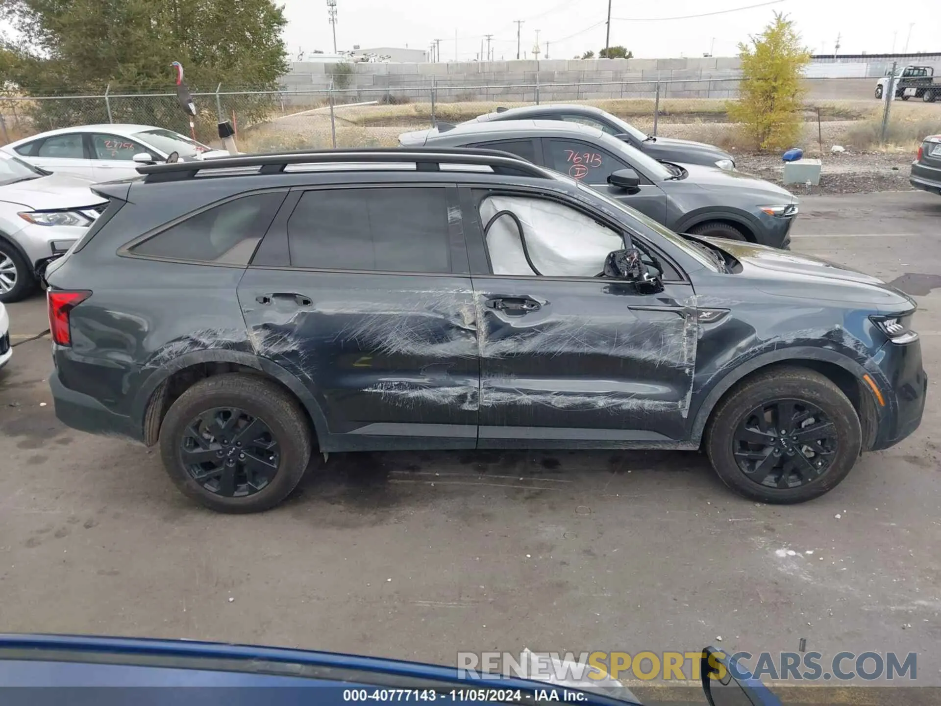 12 Photograph of a damaged car 5XYRLDLC3PG218661 KIA SORENTO 2023