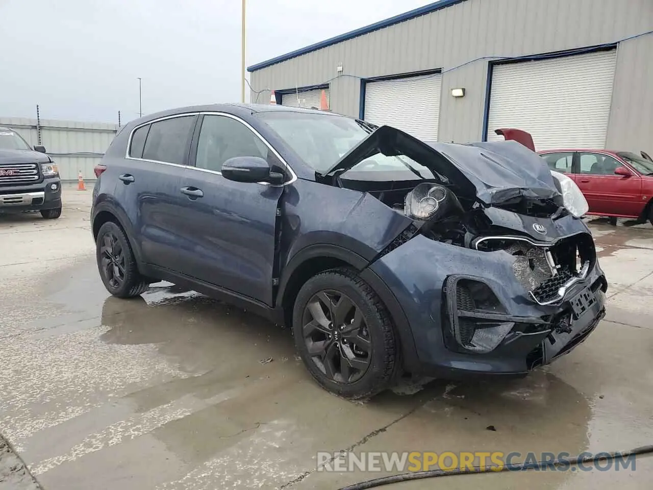 4 Photograph of a damaged car KNDPM3AC2N7998745 KIA SPORTAGE 2022