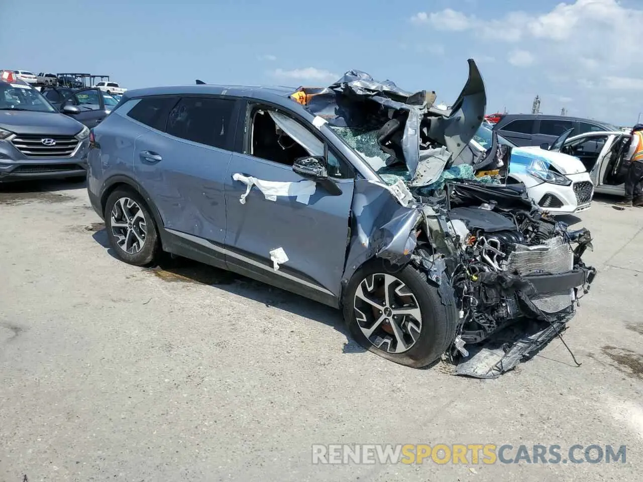 4 Photograph of a damaged car 5XYK33AF7PG043291 KIA SPORTAGE 2023