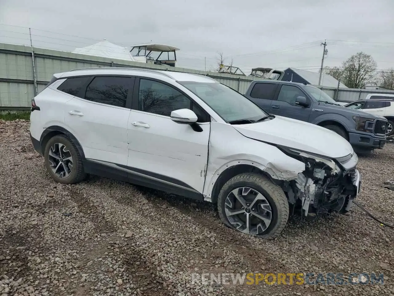 4 Photograph of a damaged car 5XYK3CAFXPG044810 KIA SPORTAGE 2023