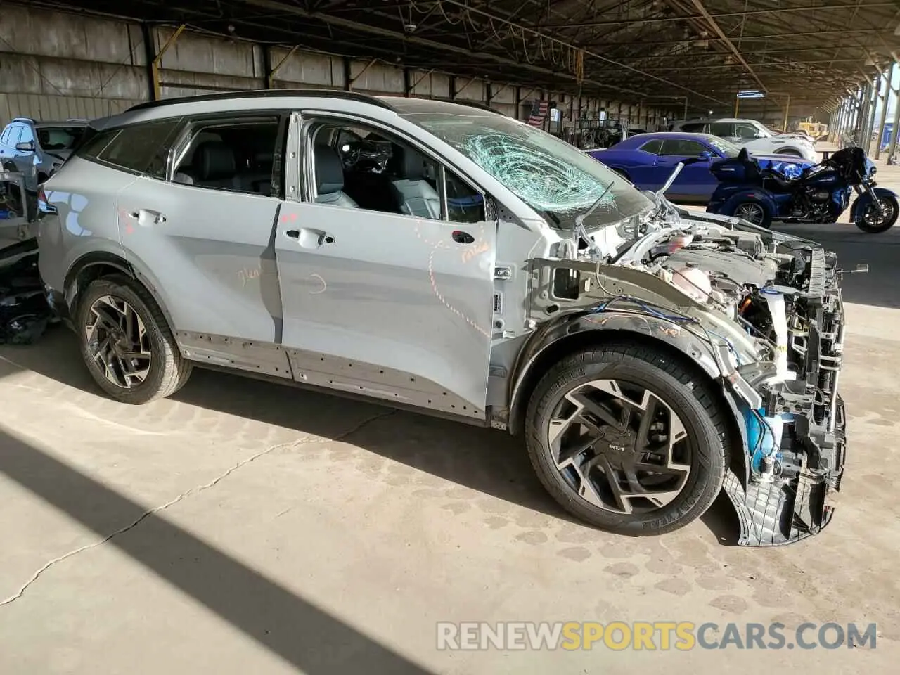 4 Photograph of a damaged car 5XYK53AF0PG013205 KIA SPORTAGE 2023