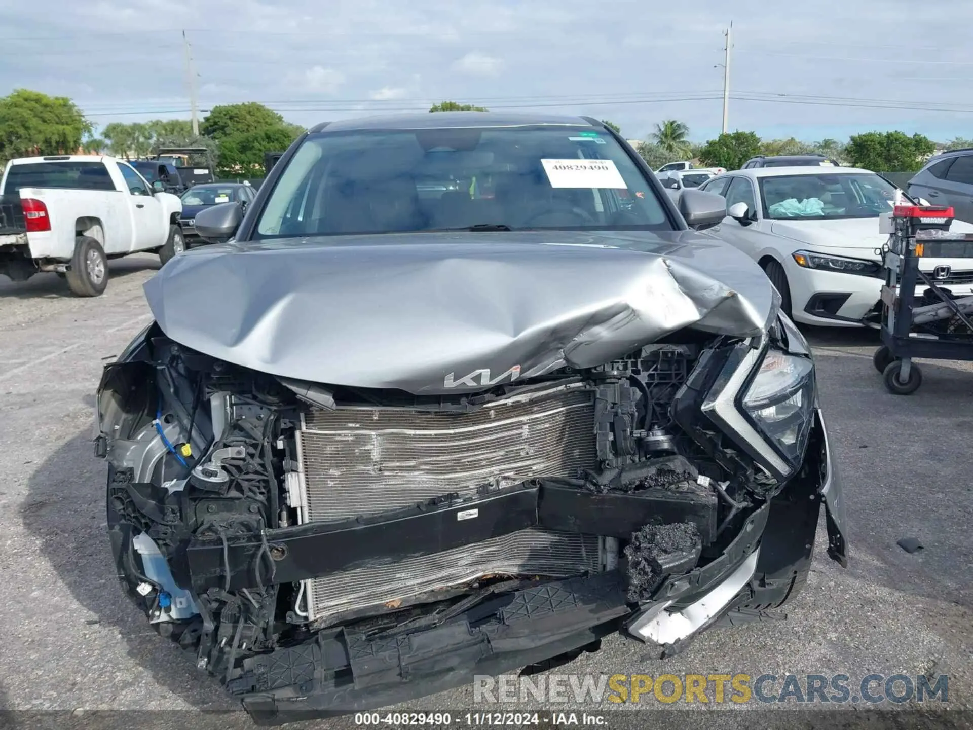12 Photograph of a damaged car KNDPU3AF0P7034089 KIA SPORTAGE 2023
