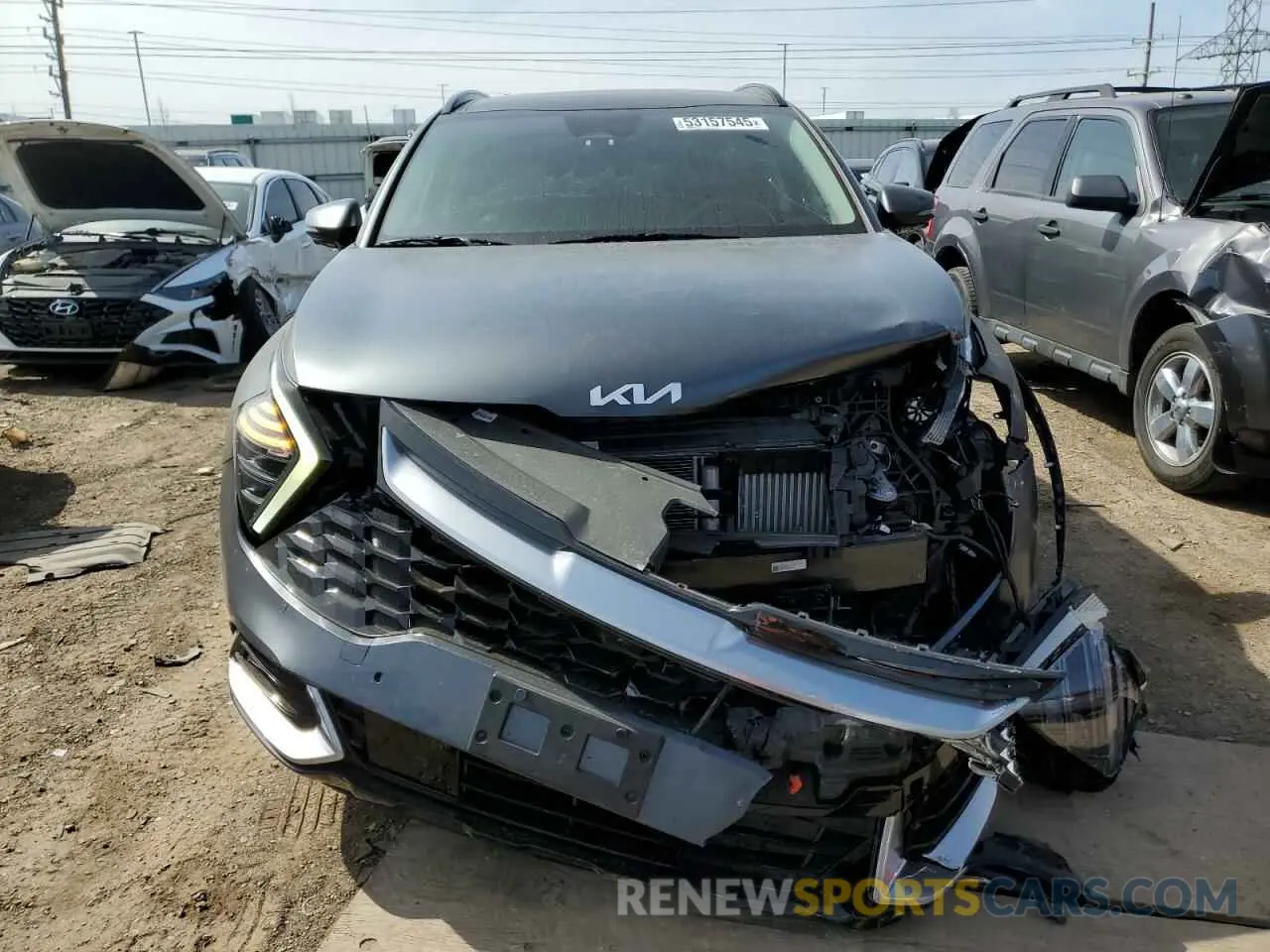 5 Photograph of a damaged car KNDPXCAG8P7010641 KIA SPORTAGE 2023