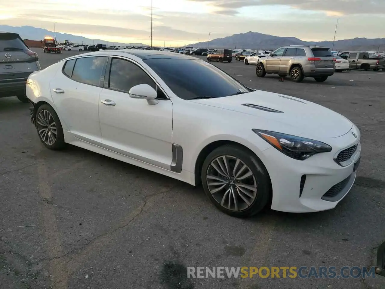 4 Photograph of a damaged car KNAE15LA6K6047955 KIA STINGER 2019